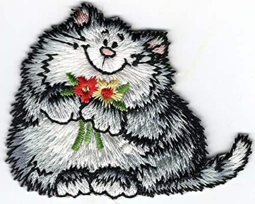 Mačka sa cvijećem željeza na mrljama mačića životinja